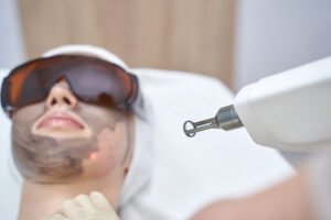 Dermatologist performing advanced skin treatment in Surat