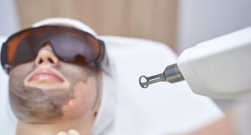 Dermatologist performing advanced skin treatment in Surat